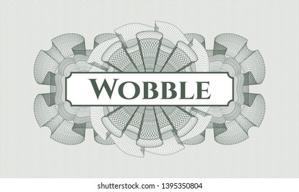 Green passport style rosette with text Wobble inside