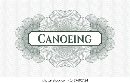 Green passport style rosette with text Canoeing inside