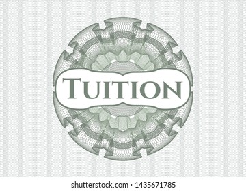 Green passport style rosette with text Tuition inside