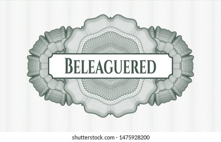 Green passport style rosette with text Beleaguered inside