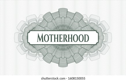 Green passport style rosette with text Motherhood inside