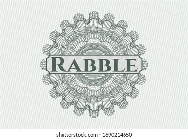 Green passport style rosette with text Rabble inside