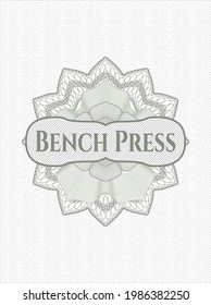 Green passport style rosette with text Bench Press inside