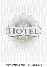 Green passport style rossete with text Hotel inside