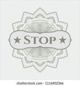 Green passport style rossete with text Stop inside