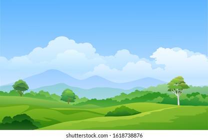 Green pasture with trees and mountain