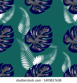 Green pattern with monstera palm leaves. Seamless summer tropical fabric design.