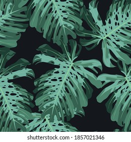 Green pattern with monstera palm leaves on black background. Seamless summer tropical fabric design.