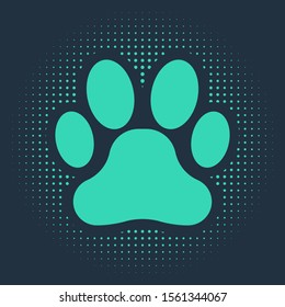 Green Paw print icon isolated on blue background. Dog or cat paw print. Animal track. Abstract circle random dots. Vector Illustration