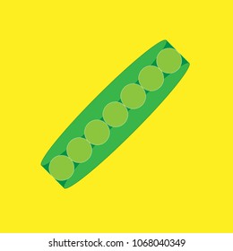 Green peas on the yellow background