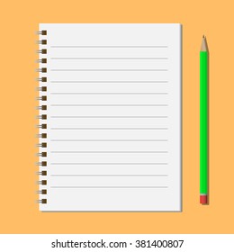 Green pencil near open notepad
