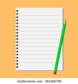 Green pencil on open notepad