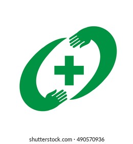 Green pharmacy cross icon. Isolated green cross in vector. Pharmacy cross in the frame of two caring hands

