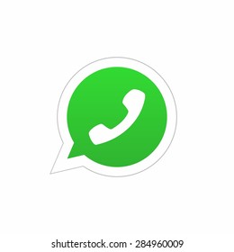 Green phone handset in speech bubble icon