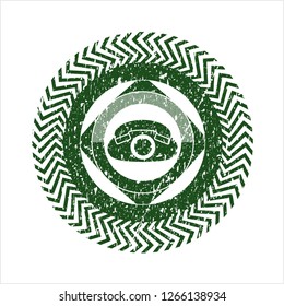 Green phone icon inside rubber grunge texture seal