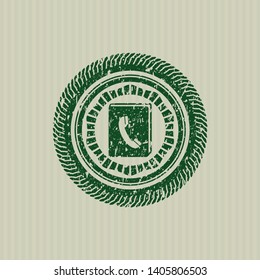 Green phonebook icon inside distress with rubber seal texture