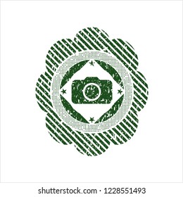 Green photo camera icon inside distress rubber grunge seal