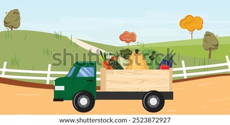 Green pickup full of vegetables, on the background a fence, field, trees and path in the background