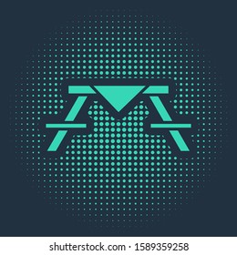 Green Picnic table with benches on either side of the table icon isolated on blue background. Abstract circle random dots. Vector Illustration