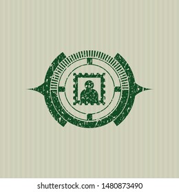 Green picture icon inside distressed rubber grunge texture stamp