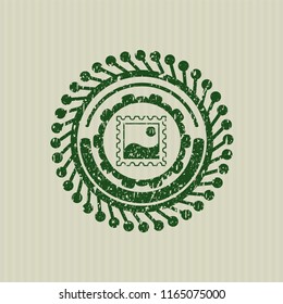 Green picture icon inside rubber seal with grunge texture
