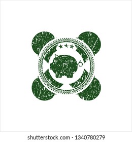 Green piggy bank icon inside grunge stamp