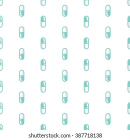Green pills on white background
