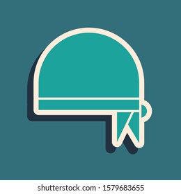 Green Pirate bandana for head icon isolated on blue background. Long shadow style. Vector Illustration