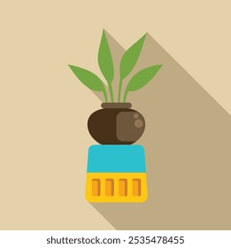 Green plant growing in a brown pot standing on a colorful stand casting a long shadow on a light brown background