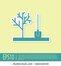 Green Planting a tree in the ground icon isolated on yellow background. Gardening, agriculture, caring for environment.  Vector Illustration