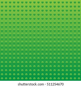 Green plastic toy building blocks. Game structure for development. 