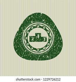 Green podium icon inside distress rubber stamp