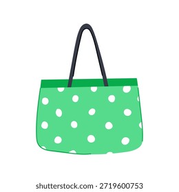Grüne Polka Dot Strandtasche, die das Accessoire für Sommerferien veranschaulicht, mit einem stilvollen Design, das perfekt für Freizeit, Urlaub und das Tragen von Essentials zum Meer geeignet ist