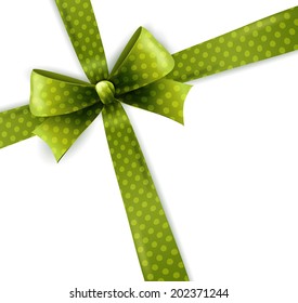 Green polka dots bow isolated on white background