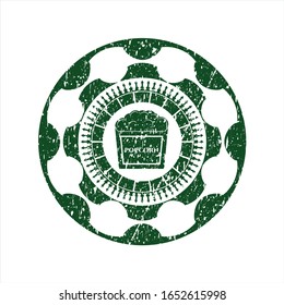 Green popcorn icon inside distress grunge seal