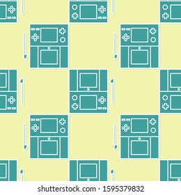 Green Portable video game console icon isolated seamless pattern on yellow background. Gamepad sign. Gaming concept.  Vector Illustration