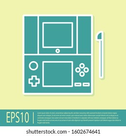 Green Portable video game console icon isolated on yellow background. Gamepad sign. Gaming concept.  Vector Illustration