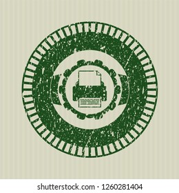 Green printer icon inside rubber grunge texture seal