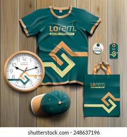 Green promotional souvenirs design for corporate identity with yellow geometric elements. Stationery set