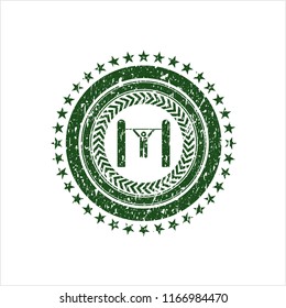 Green pull up icon inside rubber stamp with grunge texture