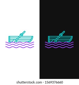 Green and purple line Fishing boat with oars on water icon isolated on white and black background.  Vector Illustration