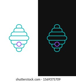 Green and purple line Hive for bees icon isolated on white and black background. Beehive symbol. Apiary and beekeeping. Sweet natural food.  Vector Illustration