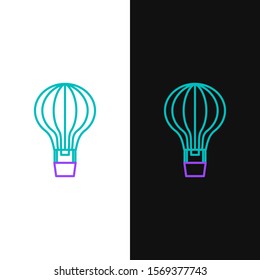 Green and purple line Hot air balloon icon isolated on white and black background. Air transport for travel.  Vector Illustration