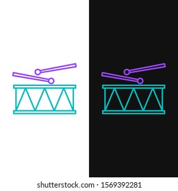 Green and purple line Musical instrument drum and drum sticks icon isolated on white and black background.  Vector Illustration
