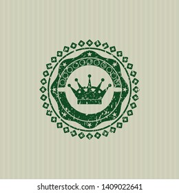 Green queen crown icon inside rubber grunge texture seal