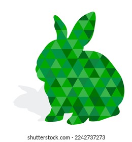 Green rabbit silhouette. Mosaic bunny icon isolated on white background. Vector illustration.