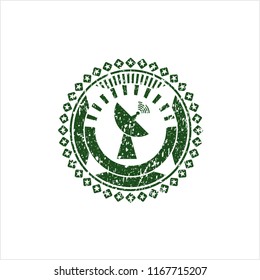 Green radar icon inside distressed rubber grunge seal