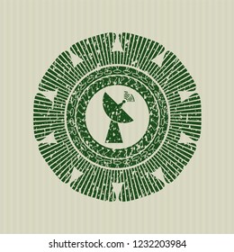 Green radar icon inside distressed rubber seal