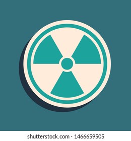 Green Radioactive icon isolated on blue background. Radioactive toxic symbol. Radiation Hazard sign. Long shadow style. Vector Illustration