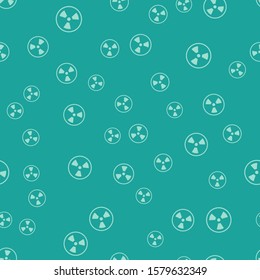 Green Radioactive icon isolated seamless pattern on green background. Radioactive toxic symbol. Radiation Hazard sign.  Vector Illustration